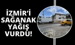 İzmir'i yaz sağanağı vurdu: 1 araç göçen yolun içine düştü