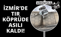 İzmir'de tır devrildi, kupası viyadükte asılı kaldı