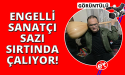 Görme engelli sanatçı sazı ensesinde çalıyor