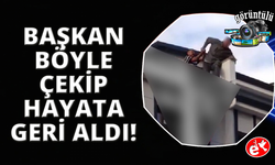 Eşiyle tartışıp çatıya çıkan genci başkan son anda çekip aldı