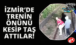Hareket halindeki trenin önünü kestiler, içeri alınmayınca treni taşladılar