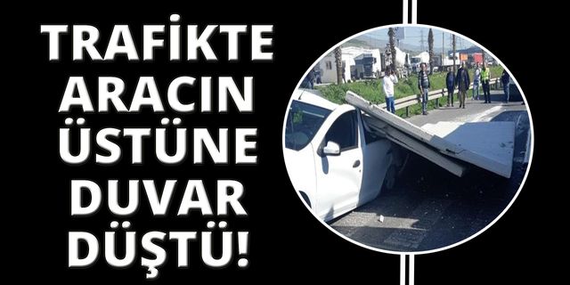 İzmir'de şaşırtan kaza! Aracın üstüne duvar düştü!