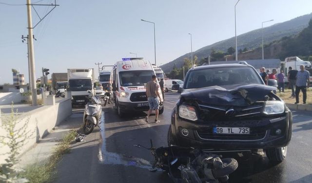 Motosiklet sürücüsü metrelerce sürüklendi