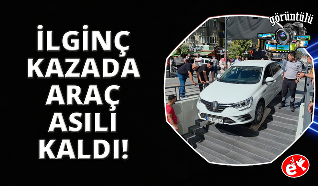Kütahya'da ilginç kaza: Otomobil marketin merdivenlerinde asılı kaldı