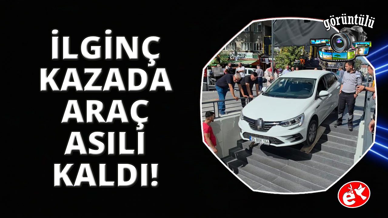 Kütahya'da ilginç kaza: Otomobil marketin merdivenlerinde asılı kaldı